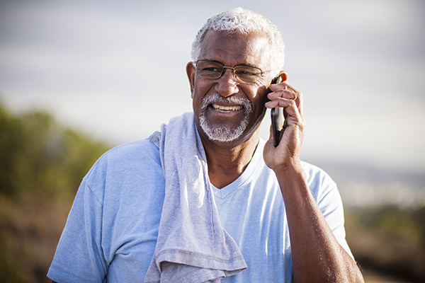 Black Man using smartphone